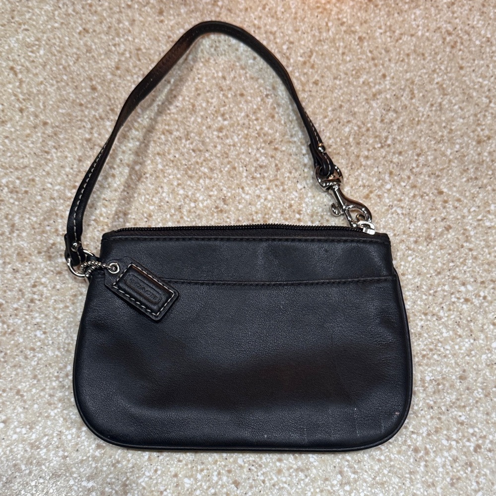 Chic coach Black Leather Wristlet, beautiful blue lining